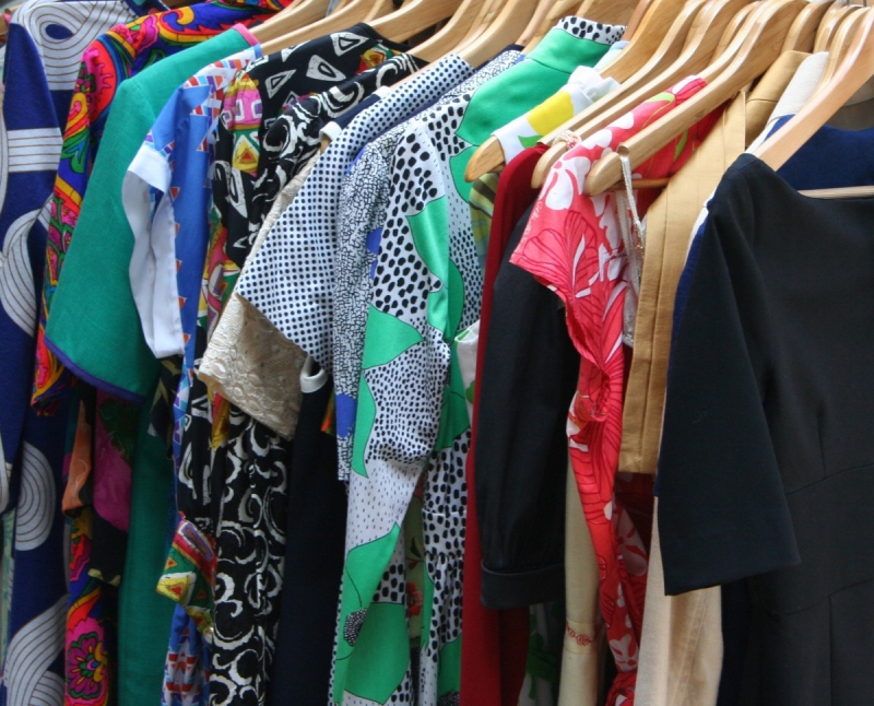 association-VENANSON-min_dresses_apparel_clothing_clothes_clothes_hangers_wooden_hangers_retail_shop_closet-1149845